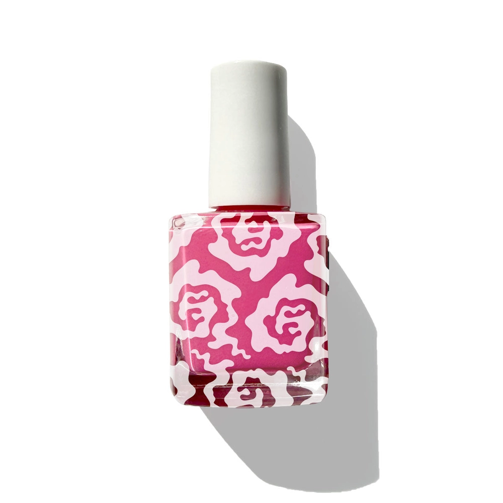 A bottle of Lychee Lacquer scented nail polish with a pink pattern